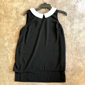 Black collared shirt. Light material